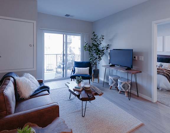 a living room with a couch and a tv