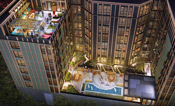 A large building with a pool in the middle of it.