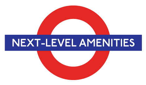 A logo with a red circle and the words "Next-Level Amenities" in blue.