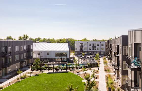 an aerial view of the courtyard of an apartment complex