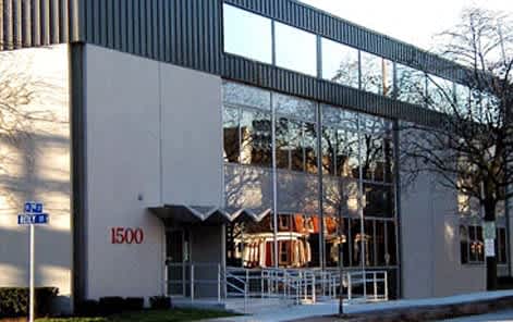 a large building with large glass windows on it