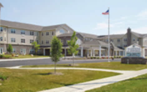 A large building with a flag on top of it.