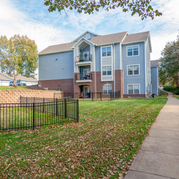 our apartments are located in a quiet neighborhood with a sidewalk