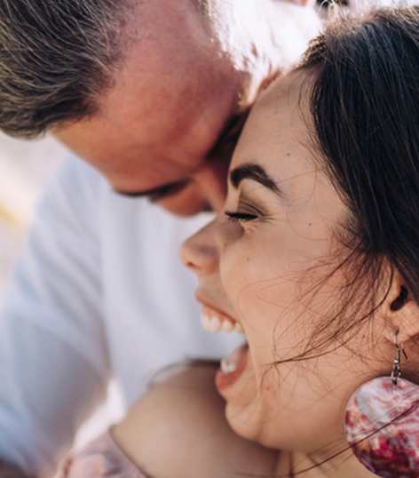 Man and a woman are embracing each other at The Graham at Southern Towers, Virginia