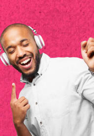 a man in a white shirt is wearing headphones
