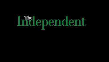 a green neon sign with the word paranoia