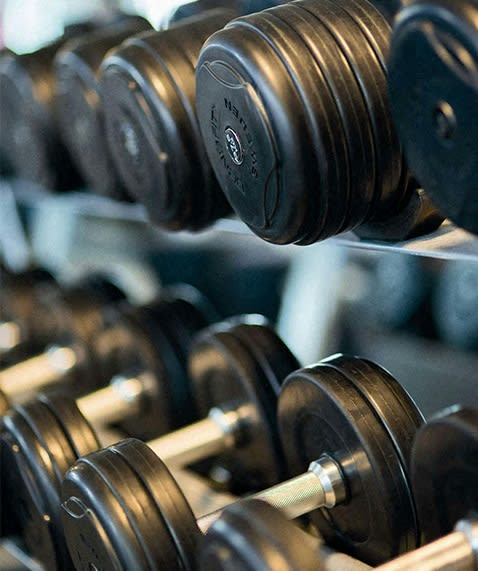 a rack of weights in a gym at East 4th Street, Cleveland, OH