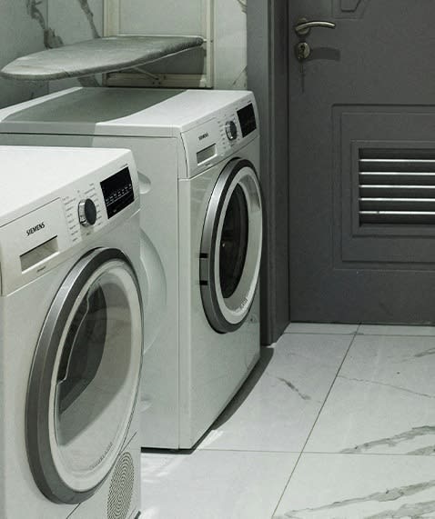 a washer and a dryer in a laundry room at East 4th Street, Cleveland, OH, 44115