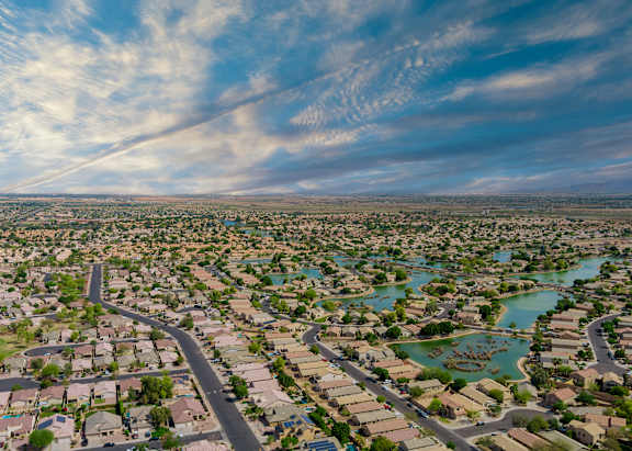A residential area with a river running through it.