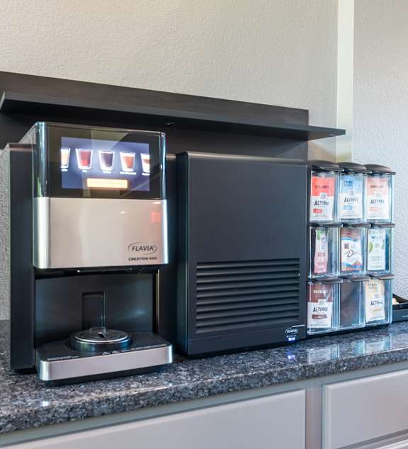 Coffee machine placed on granite top counter at The Falls, Mission