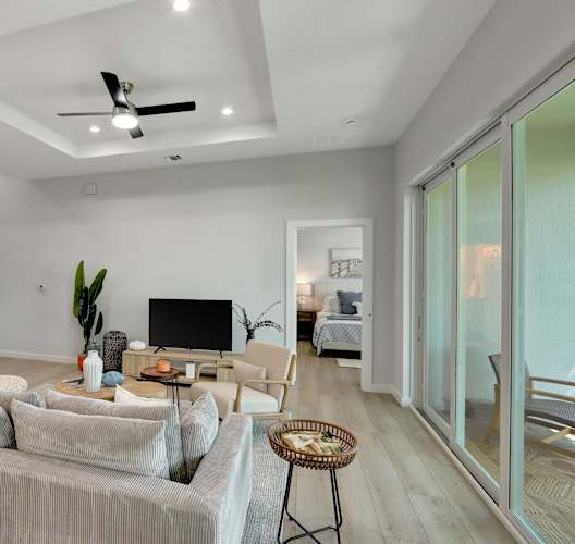 a living room with a couch and a tv