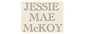 A white sign with black text that reads "Jessie Mae McKoy".