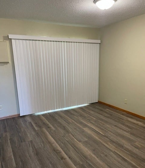 a living room with a couch and a chair and a table