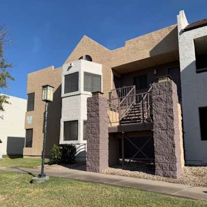 A modern building with a staircase leading to the second floor at Ascent on Spence, Tempe Arizona