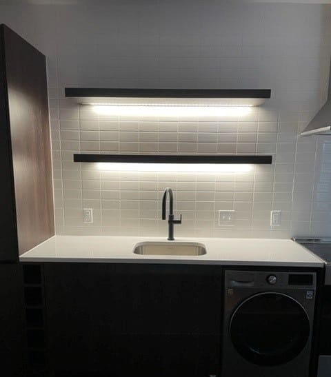 Kitchen cabinetry and floating shelves
