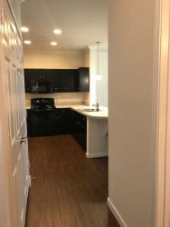Wood-inspired plank flooring in living areas at CLEAR Property Management , The Lookout at Comanche Hill, San Antonio, Texas