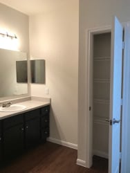 Renovated Bathrooms With Quartz Counters at CLEAR Property Management , The Lookout at Comanche Hill Apartments, San Antonio