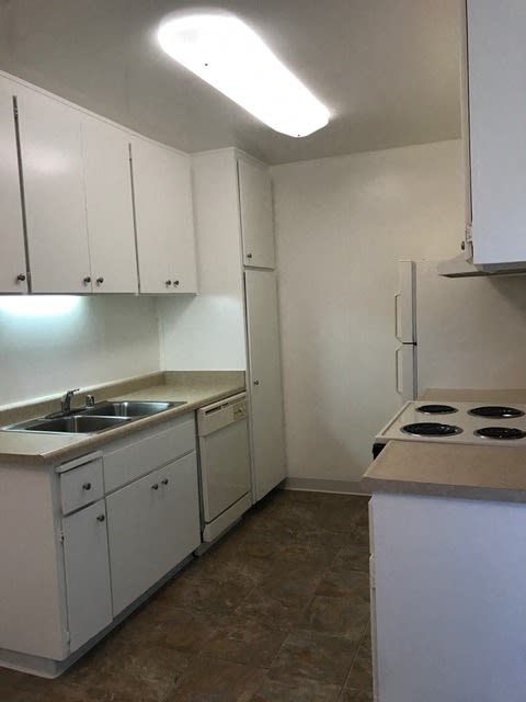 kitchen with white cabinetry