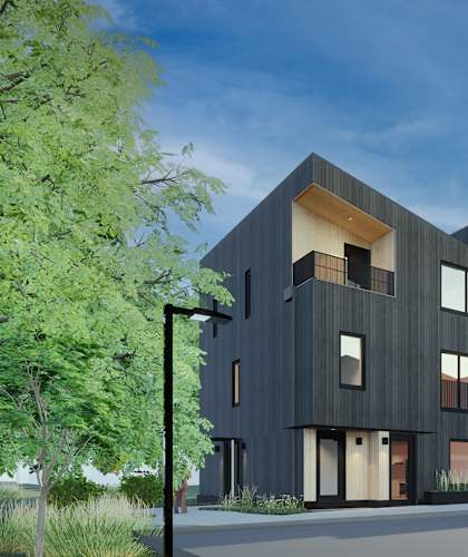 A modern building with a black facade and large windows. at The Grove Apartments, Orillia