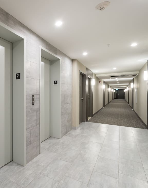 a hallway with a door that has the number 355 on it