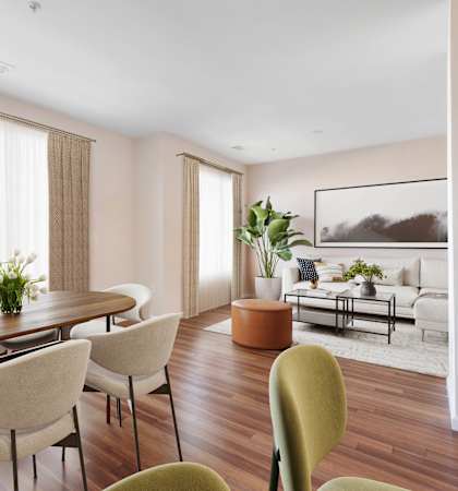 a dining room with a table and chairs at West 130, West Hempstead, 11552