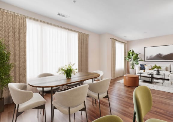 a dining room with a table and chairs at West 130, West Hempstead, 11552