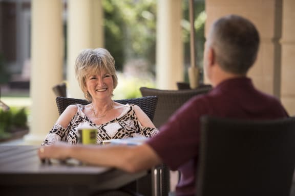 a man and a woman sitting at a table