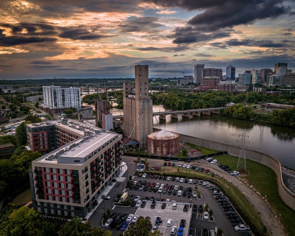arial view of a city with a river in the background
