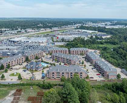 an aerial view of a parking lot in a city
