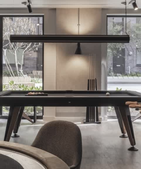 a living room with couches and a coffee table