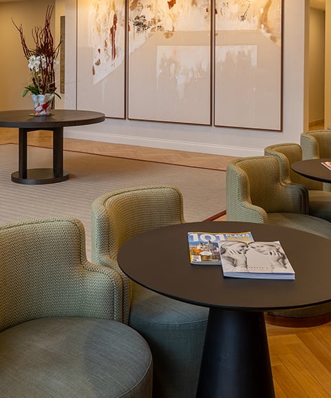 a living room with couches and a coffee table