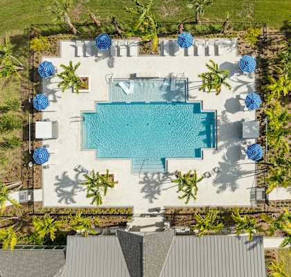 a birds eye view of the pool at the resort at longboat key club
