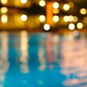 Blurred Photo of Pool and Lights