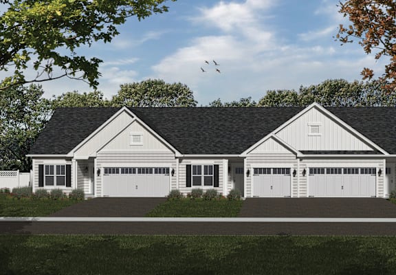 A two-story house with a white exterior and a black roof.