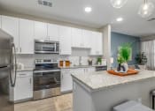 Thumbnail 12 of 20 - Image of a kitchen