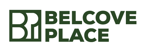 a green and white sign that reads believe in place
