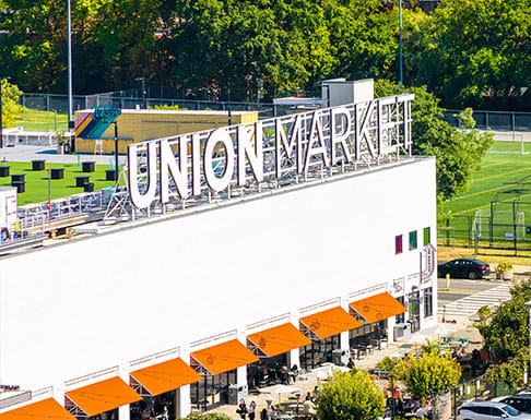 a large white building with a sign on top of it