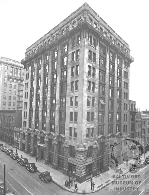 a black and white photo of a tall building