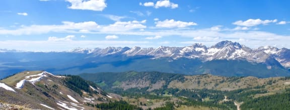 a view from the top of a mountain overlooking a valley