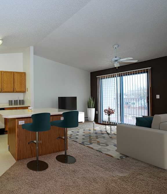 an open kitchen and living room with a table and chairs