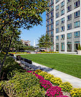 A large building with a green lawn in front of it. at 360 State Street, Connecticut
