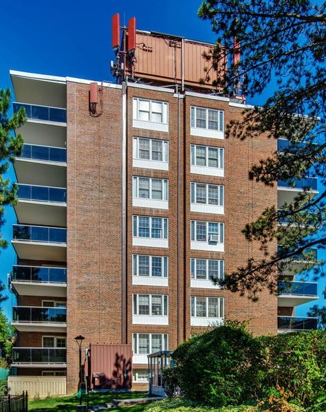 Exterior view of the complex on a blue sky day.