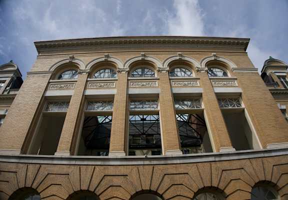 the facade of a building with a row of windows