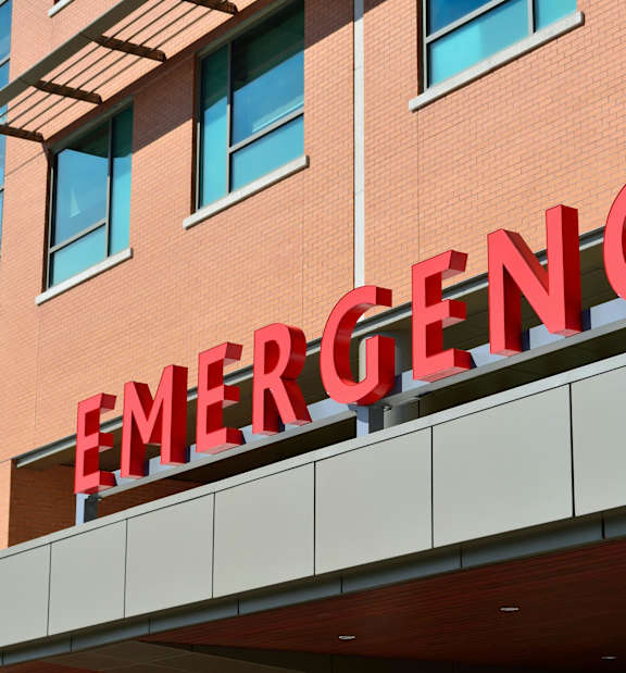 A red emergency sign on a building.