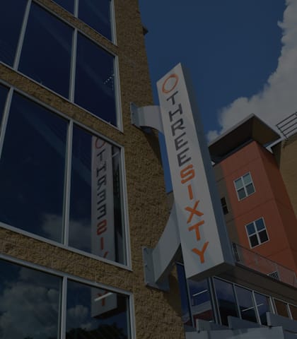 the facade of a building with a sign for the center for health and wellness
