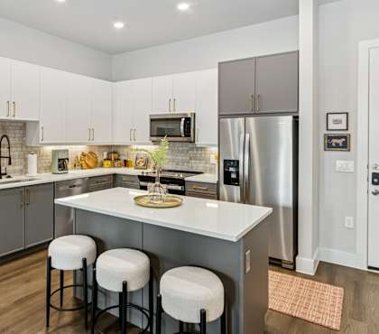 Model kitchen in slate design at The Waylon in McKinney TX