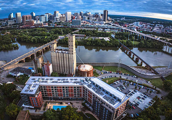 A cityscape with a river running through it.