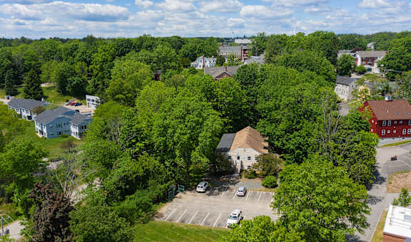 arial view of a church in the middle of a city