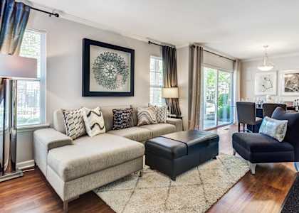 a living room with a couch and a chair