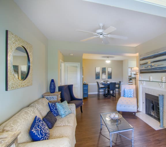 Enclave at Wolfchase Apartments in Cordova Tennessee photo of a living room filled with furniture and a fireplace